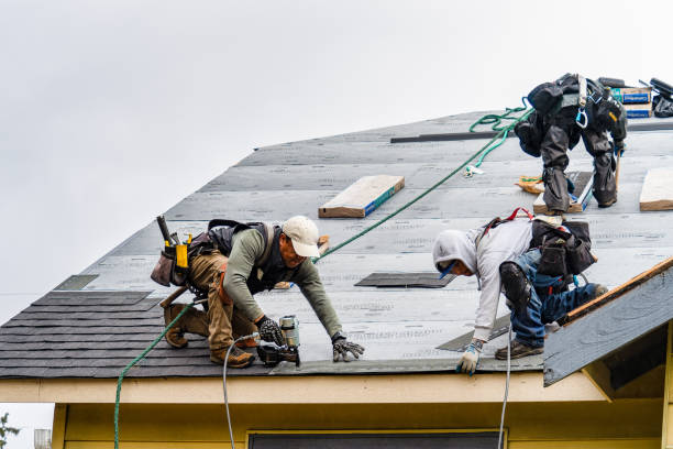 Professional Gutter Installation technician working in Wilton, CT